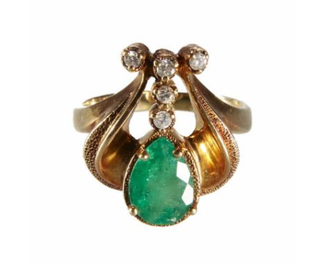 14ct yellow gold emerald and diamond ring,the lyre shaped head comprising pear shaped mixed cut emerald measuring approx. 10.