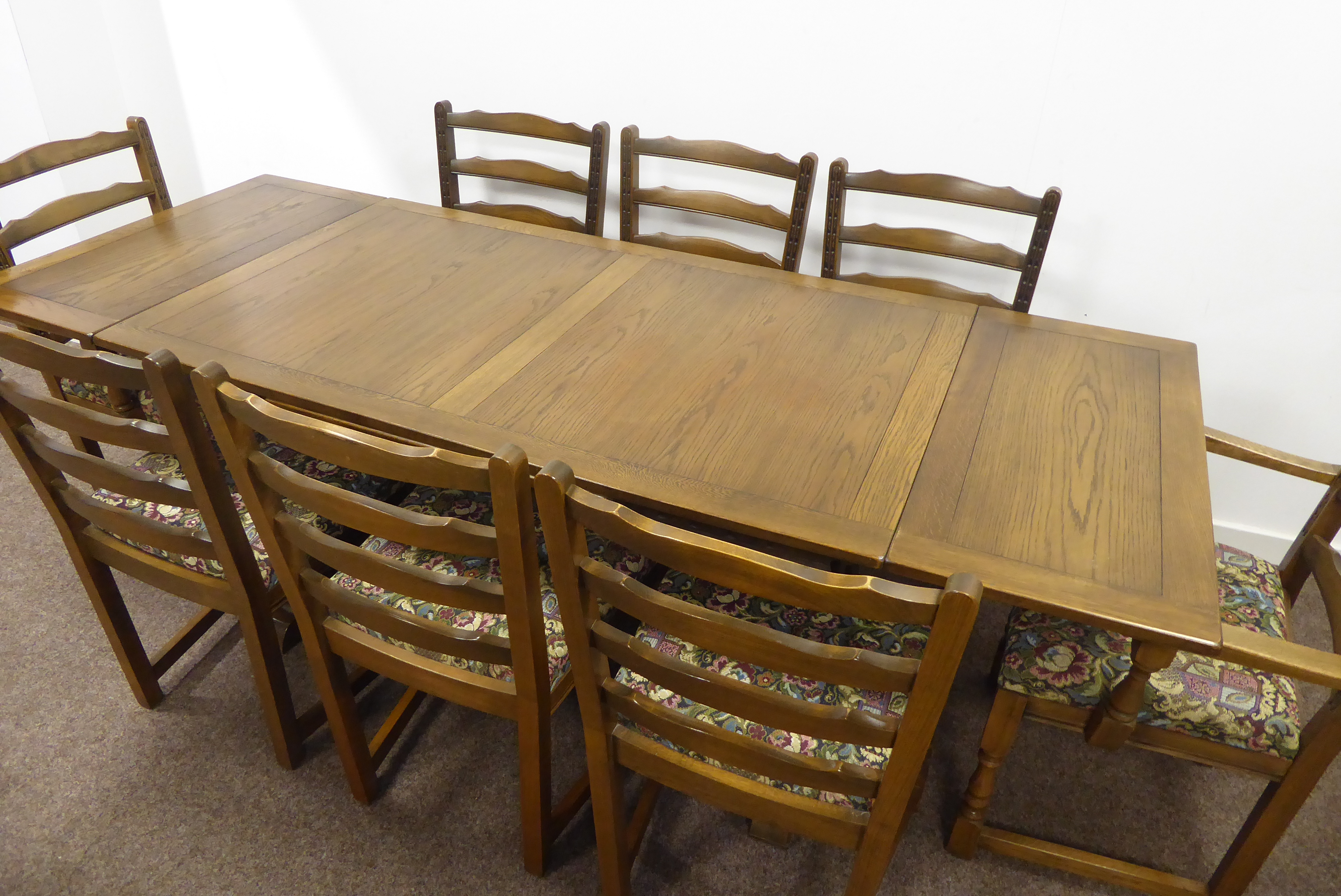20th century oak refectory style dining table, pull out leaves, pierced
