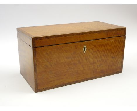 George III satinwood tea caddy of Sheraton design, crossbanded in rosewood and with ivory key plate, the interior with 2 cove