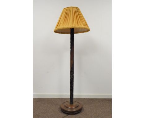 Mid 20th century Chinese carved hardwood standard Lamp, turned base, together with decorative tasseled lamp shade, H167cm Con