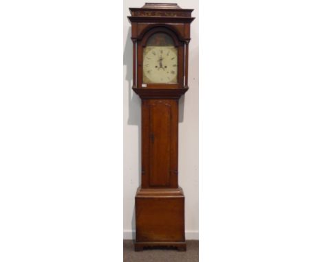 Early 19th century oak and walnut banded longcase clock, scrolled floral fret work frieze above stepped arched hood, enclosed