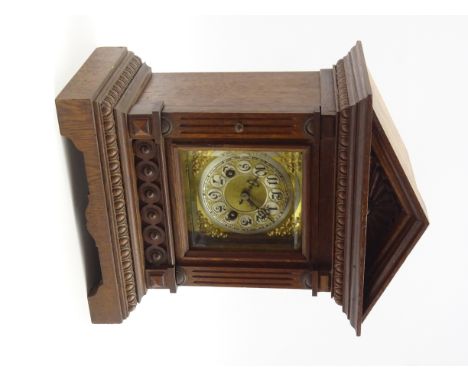 Late 19th century oak architectural cased mantel clock, pointed arched top above egg and dart moulded cornice, gilt and silve