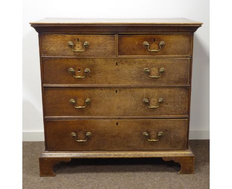 George III oak chest, projecting top over two short and three long graduating drawers, bracket feet, W113cm, H100cm, D57cm, o