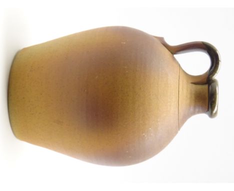 John Leach (b1939) A Muchelney studio pottery flagon with loop handle H38cm Condition Report & Further Details Click here for