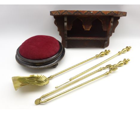 Victorian ebonised circular foot stool, Indian wall bracket with painted decoration and 3 brass fire irons  Condition Report 