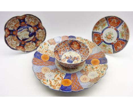 Large late 19th Century Japanese Imari pattern charger decorated with panels of flowers in orange, blue etc. D55cm 2 smaller 