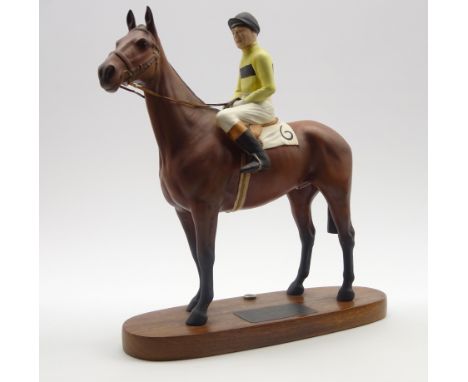 Beswick model of Arkle with Pat Taafe up No. 2084 from the Connoisseur series on a wooden base  Condition Report & Further De