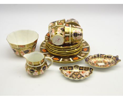 Four Royal Crown Derby Imari pattern tea cups and saucers, 3 tea plates, 2 bread and butter plates, milk jug and sugar bowl a