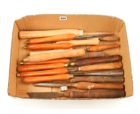 Ten turning tools and 10 spare handles G