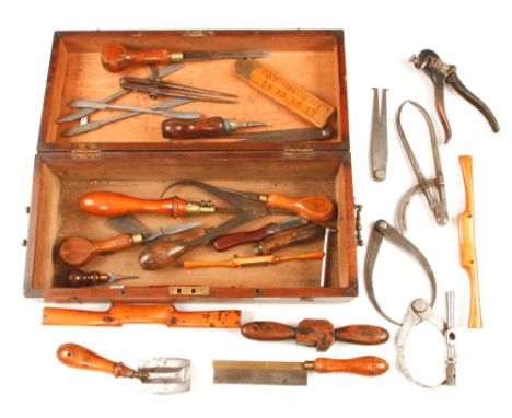 A quantity of small tools in pine box G+