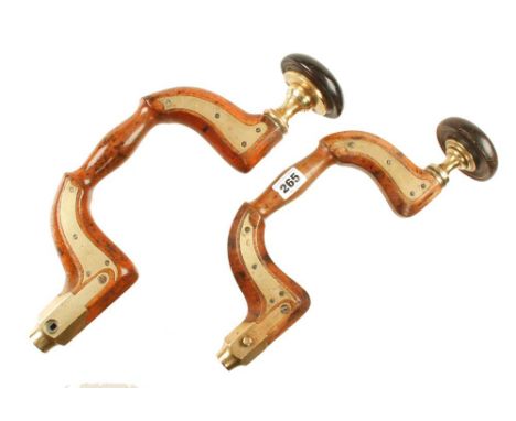 Two brass plated beech braces, one by JOSEPH COOPER lacking button pad and the other by MOULSON BROS G