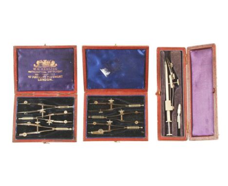 A set of spring bows by HARLING, another set and a rotating compass all in orig boxes G+