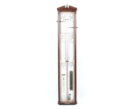 An Admiral Fitzroy Gothic tracery barometer in a mahogany case. Plaque numbered 1313/2000 to lower edge, together with a baro