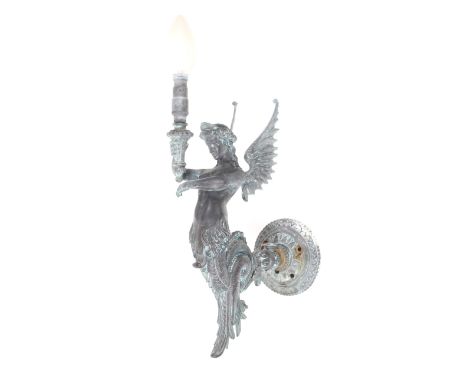 A Victorian patined brass wall bracket gas lamp. Circa 1860, modelled as a female mythical figure, later converted to electri