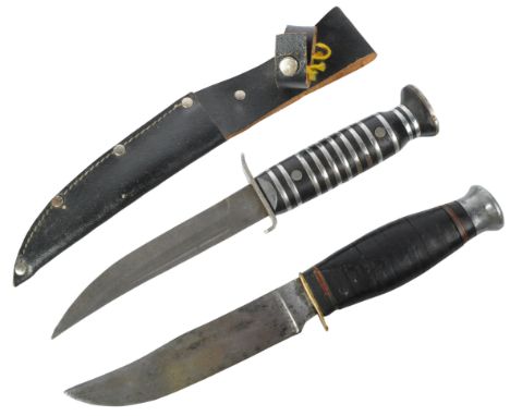 Two WWII Second World War Third Reich Nazi German trench fighting knives / boot knives. Both having smooth steel pommels, one