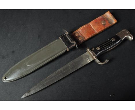 A WWII Second World War period German Third Reich trench warfare fighting knife in the manor of a German bayonet. The knife h