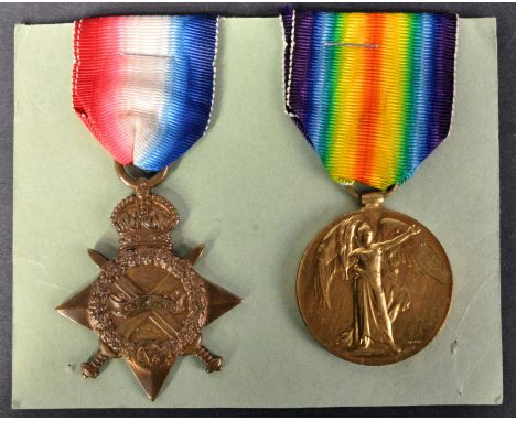 A WWI First World War medal pair awarded to one 22660 Private F Robinson of the Durham Light Infantry comprising his Victory 
