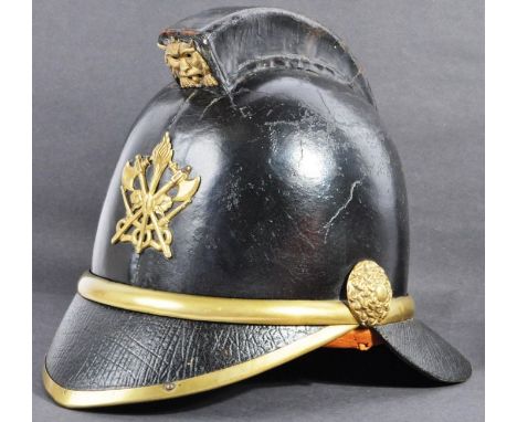 A 19th Century Victorian leather and brass fireman's / fire helmet. Sturdy black leather construction, with brass furniture a