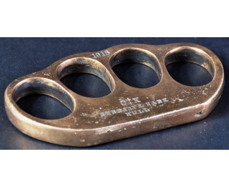 An original WWI First World War British Army Special Ops trench warfare knuckleduster / knuckle duster. Brass construction wi