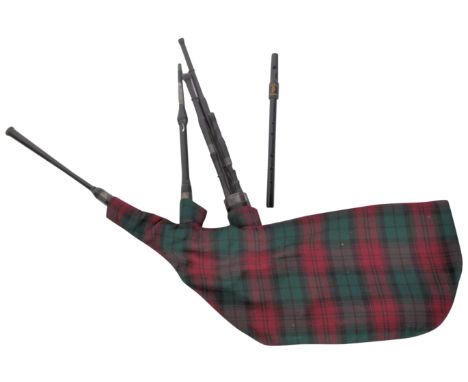 A set of 20th Century Scottish Highland ' Lindsay ' bagpipes with a chanter whistle. Tartan covered bag with black hardwood p