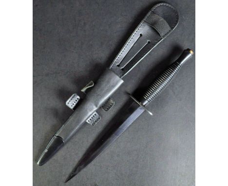 An original current issue FS Fairbairn Sykes British commando knife dagger. The knife having a nut to the pommel, ribbed hand