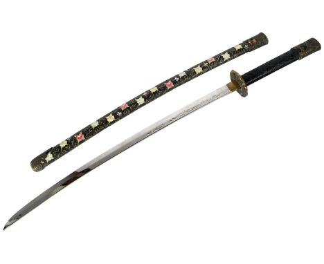 A 20th Century Japanese style Katana / Samurai sword. The sword having a brass capped pommel carved with scrollwork and a bla