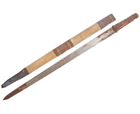 An antique 19th century Arabic / African tribal sword. The sword with a leather covered wooden pommel and handle, leading to 