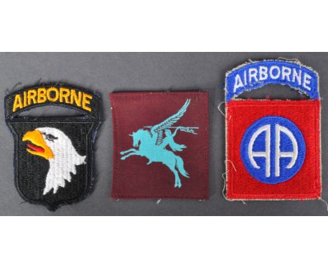 A collection of three 20th Century WWII Second World War British and US United States Airborne division formation cloth patch
