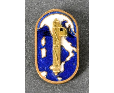 A WWII Second World War Italian National Fascist Party membership button hole badge. The brass badge having a blue enamel bac