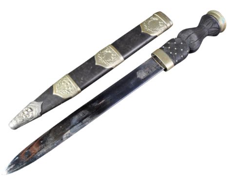 A late 20th Century / Cold War period Scottish Highland Pipers dirk. The dagger having a white metal pommel with Queens crown