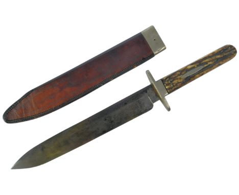 A late 19th Century Joseph Rodgers hunting knife. Stag horn grip encasing the blade tang secured by rivets and the ricasso st