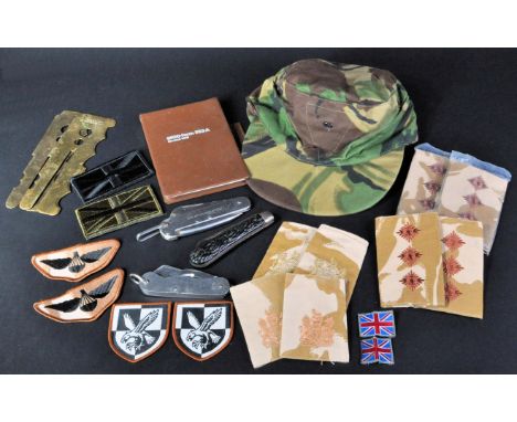 A collection of vintage post WWII Second World War British Army military items to include; x2 button polishing brasses, x7 as