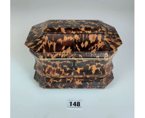 Regency Tortoiseshell veneered tea caddy with twin compartment, c. 1820.  Lid damaged. 7.5” long x 5” wide x 6” high