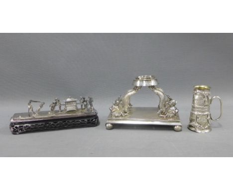 A collection of Chinese silver and white metal items to include a rectangular stand with dragons, a pierced hardwood stand wi