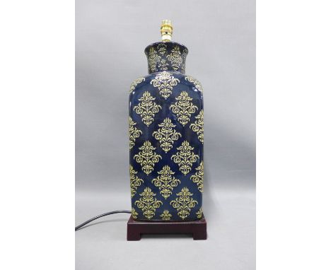 Pottery table lamp base , navy blue glazed with damask style incised pattern, of square form, on a plinth base, approx 54cm 