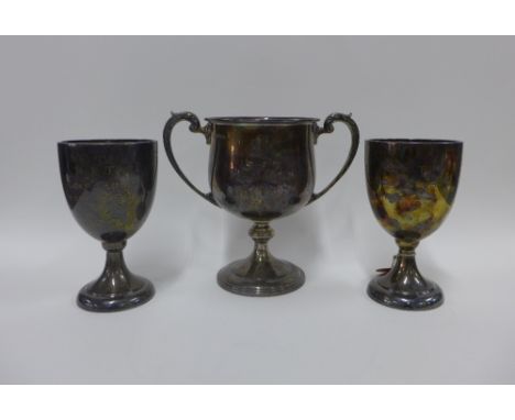 George V silver twin handled trophy cup, Birmingham 1937 and two Walker &amp; Hall silver goblet trophy cups, Sheffield 1936,