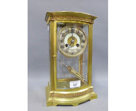 Brass mantle clock with four glass panels, silvered chapter ring with Roman numerals, 30 x 19cm 