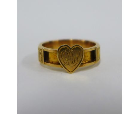 18ct gold ring Memento Mori ring, the band with five engraved panels and an initialed  heart plaque, UK ring size   approx 3.