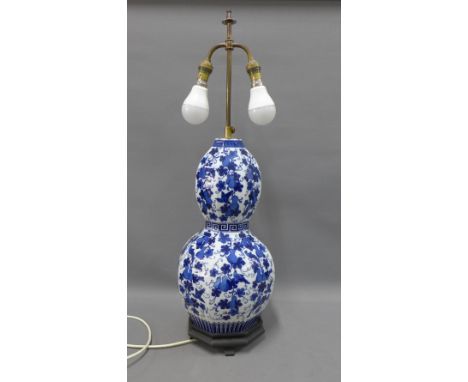 Chinse style blue and white double gourd table lamp base with two light fittings, on a octagonal base, approx 73cm to top 