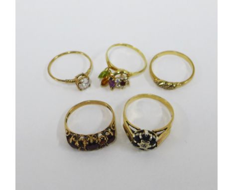 Five 9ct gold gemset rings to include a garnet ring with one small stone missing (5) 