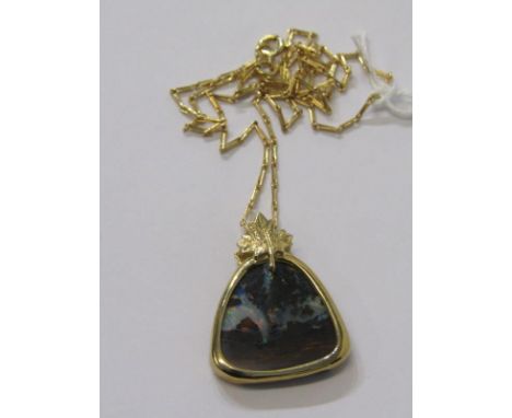 SPECTACULAR BOULDER OPAL PENDANT with leaf design setting, on 9ct yellow gold, with original receipt from 2012 