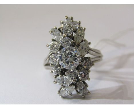 SPECTACULAR DIAMOND CLUSTER RING, principal brilliant cut diamond approx. 1 carat, surrounded brilliant and marquise cut diam