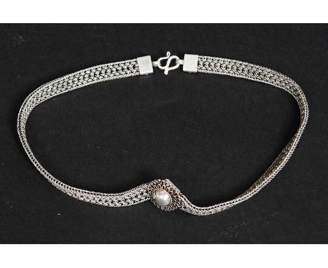 A silver 925 ladies choker necklace of mesh chain form having finial pendant centre. The clasp marked 925. Total weight 53.9g