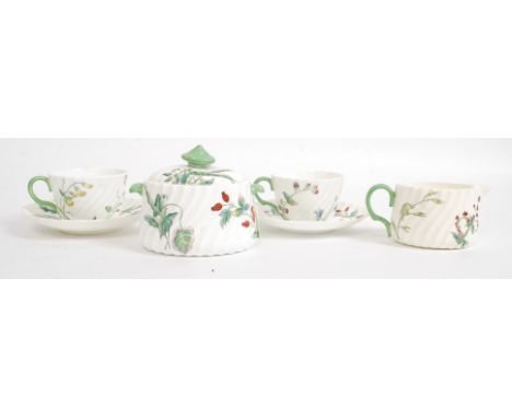 A beautiful Mintons leadless glaze chintz pattern tea for 2 service comprising 2 cups and saucers, sugar bowl and creamer. St