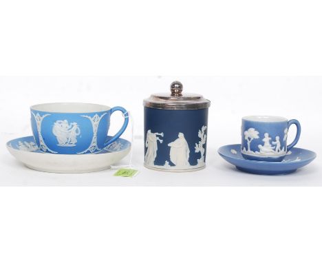 A Victorian Wedgwood light blue jasperware cup and saucer having cherub cameo scenes. Together with an unmarked smaller 19th 
