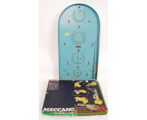 A vintage Amersham Toys made wooden bagatelle, along with a vintage Meccano set within the original box. 