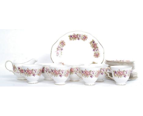 A Colclough chintz pattern part tea service comprising cups, saucers, plates, sandwich plate, creamer  etc