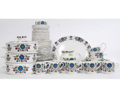 A large quantity of Midwinter dinner service items to include plates, bowls, cups and other pieces. Each decorated with a ret