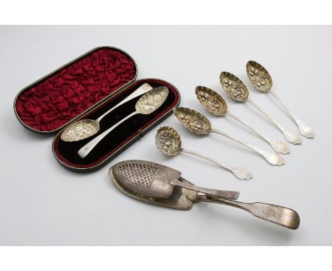 A GEORGE III FIDDLE AND THREAD &amp; DROP PATTERN FISH SLICE with an articulated upper blade by W. Eley, London 1819, a cased