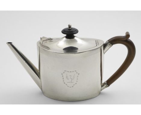A GEORGE III OVAL TEA POT with a straight, tapering spout, light border engraving and a cartouche on each side, crested, the 